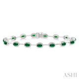 5x3 MM Oval Cut Emerald and 5/8 Ctw Round Cut Diamond Precious Bracelet in 14K White Gold