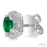 5x3 MM Oval Cut Emerald and 1/10 ctw Single Cut Diamond Earrings in 14K White Gold