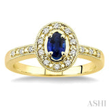 5x3 MM oval cut Sapphire and 1/10 ctw Single Cut Diamond Ring in 10K Yellow Gold.