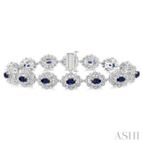 5x3 MM Oval Cut Sapphire and 1 Ctw Round Cut Diamond Precious Bracelet in 14K White Gold