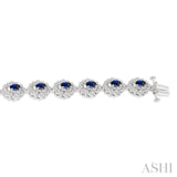 5x3 MM Oval Cut Sapphire and 1 Ctw Round Cut Diamond Precious Bracelet in 14K White Gold