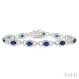 6x4 MM Oval Cut Sapphire and 1 3/4 Ctw Round Cut Diamond Precious Bracelet in 14K White Gold