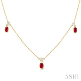 5x3 MM Oval Shape Ruby and 1/4 Ctw Round Cut Diamonds Precious Station Necklace in 14K Yellow Gold