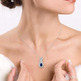 6x4 MM Oval Cut Sapphire and 1/5 Ctw Round Cut Diamond Pendant in 10K White Gold with Chain