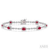 5x3 MM Oval Cut Ruby and 1/20 Ctw Single Cut Diamond Bracelet in 14K White Gold