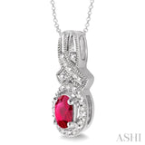 5x3 MM Oval Cut Ruby and 1/50 Ctw Round Cut Diamond Pendant in Sterling Silver with Chain