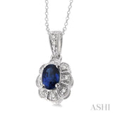 6x4 MM Oval Cut Sapphire and 1/20 Ctw Round Cut Diamond Pendant in Sterling Silver with Chain