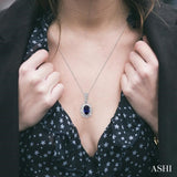6x4 MM Oval Cut Sapphire and 1/20 Ctw Round Cut Diamond Pendant in Sterling Silver with Chain