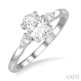 3/4 Ctw Pear and Oval Cut Diamond Ladies Engagement Ring With 1/2 Ct Oval Cut Center Stone in 14K White Gold