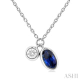 1/50 ctw Oval Cut 6X4MM sapphire and Bezel Set Round Cut Diamond Precious Necklace in 10K White Gold