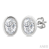 1/5 Ctw Petite Bezel Set Oval Cut Diamond Fashion Stud Earrings in 10K White Gold