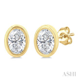 1/5 Ctw Petite Bezel Set Oval Cut Diamond Fashion Stud Earrings in 10K Yellow Gold